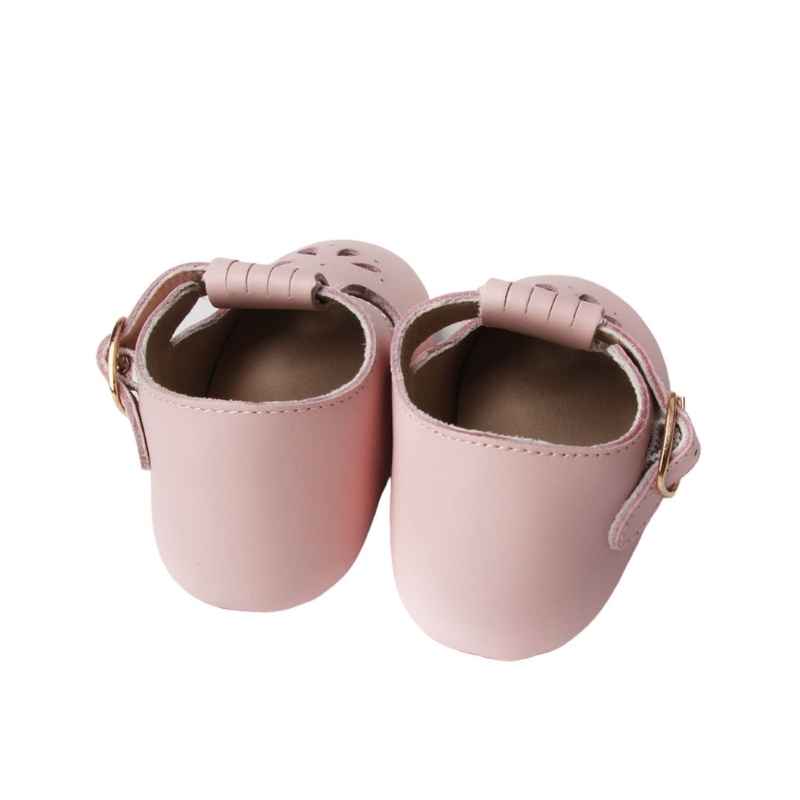 Pastel Pink T bar Leather shoes with petal shape cut out detail over toe rear view