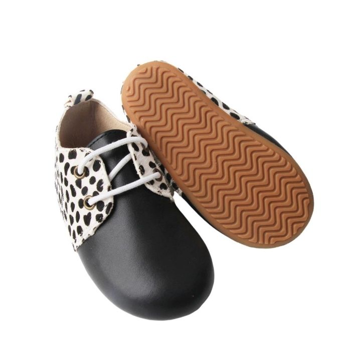 Grip Sole Toddler Boots Animal Print with Black toe lace up side view