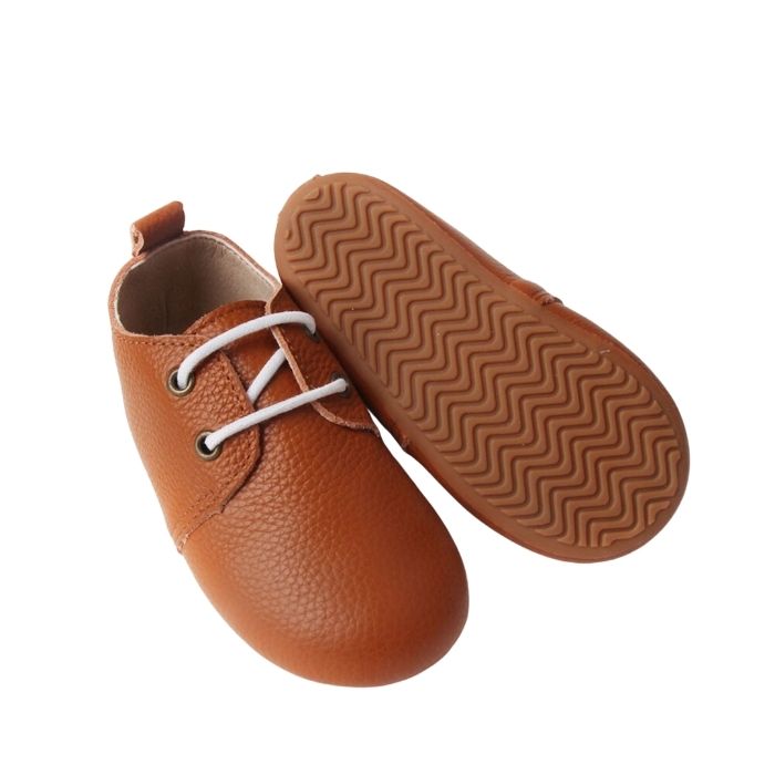 Brown Leather Lace Up Low Rise Boots Grip sole view