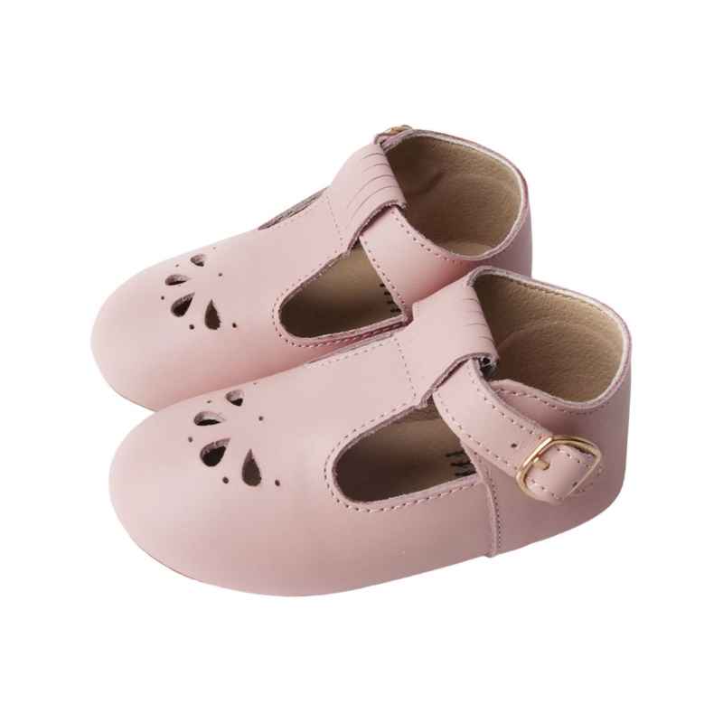 Pastel Pink T bar Leather shoes with petal shape cut out detail over toe side view