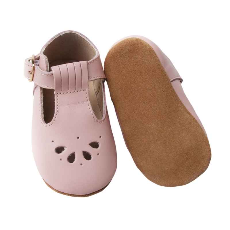 Pastel Pink T bar Leather shoes with petal shape cut out detail over toe sole view