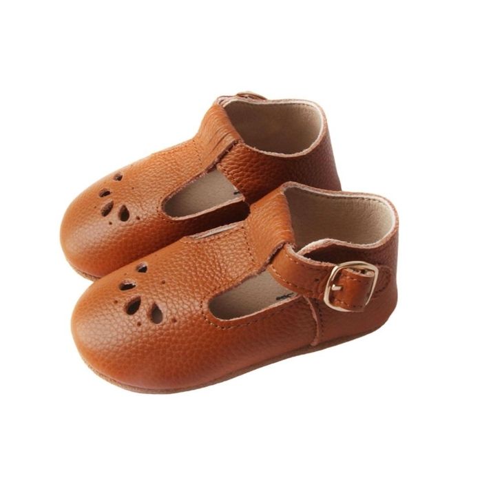 Tan Colored Leather T bars shoes petal cutout details over toe faux buckle side view