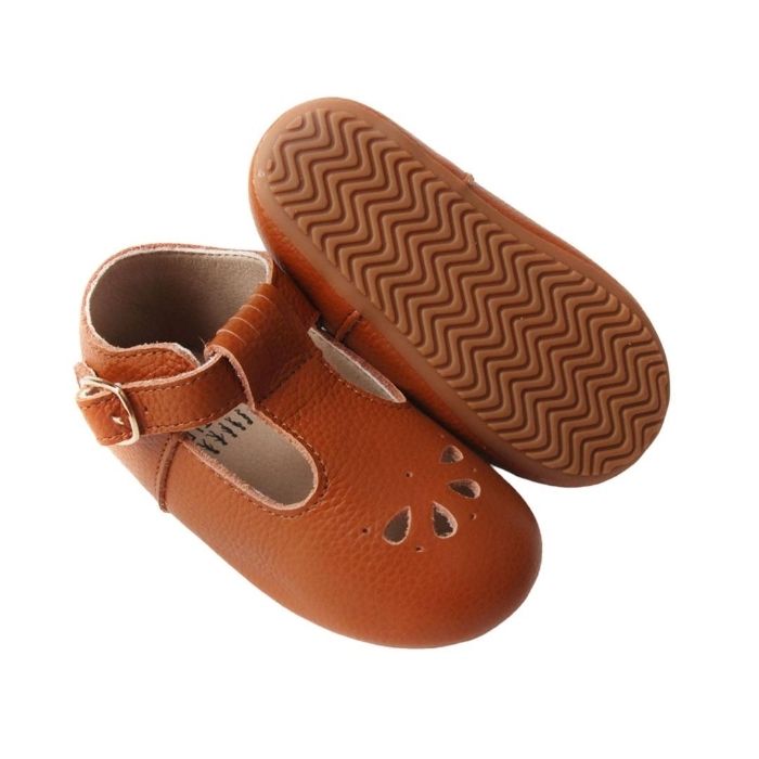 Tan Colored Leather T bars shoes petal cutout details over toe faux buckle side view