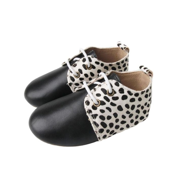 Grip Sole Toddler Boots Animal Print with Black toe lace up side view